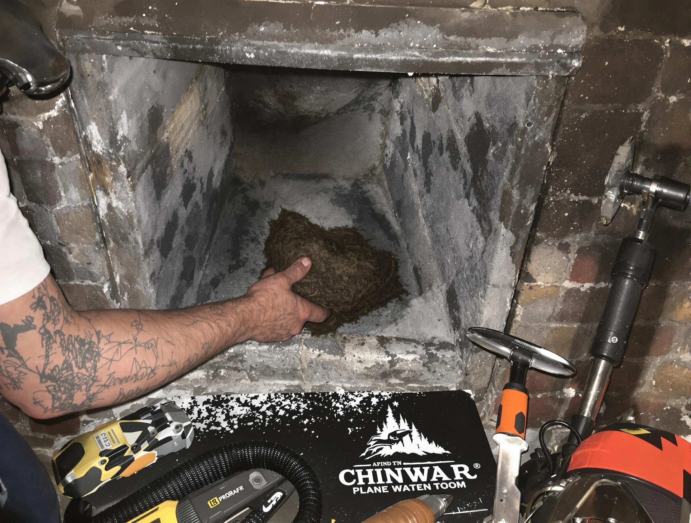 Bessemer Chimney Sweep safely removing debris and screening chimney in Bessemer, AL